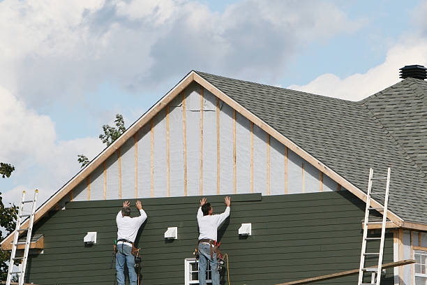 Professional Siding Replacement technician working in Fort Loramie, OH